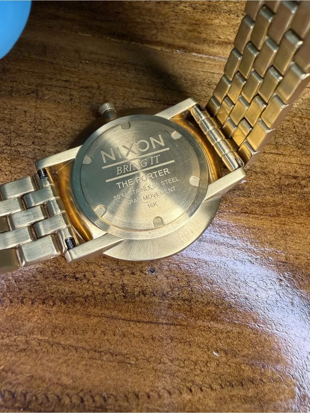 Nixon Gold Stainless Steel Watch with Green Dial